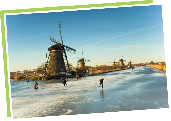 Story Photo3 windmill by frozen river with children skating
